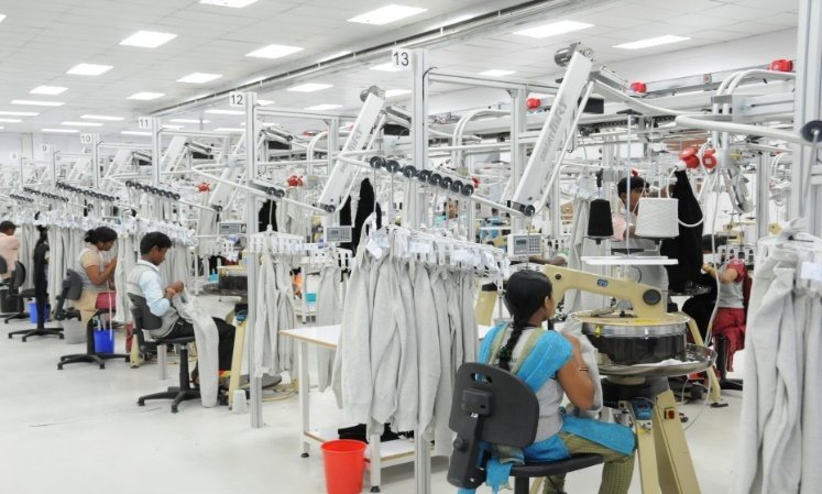 Operators at work on a garment sewing line